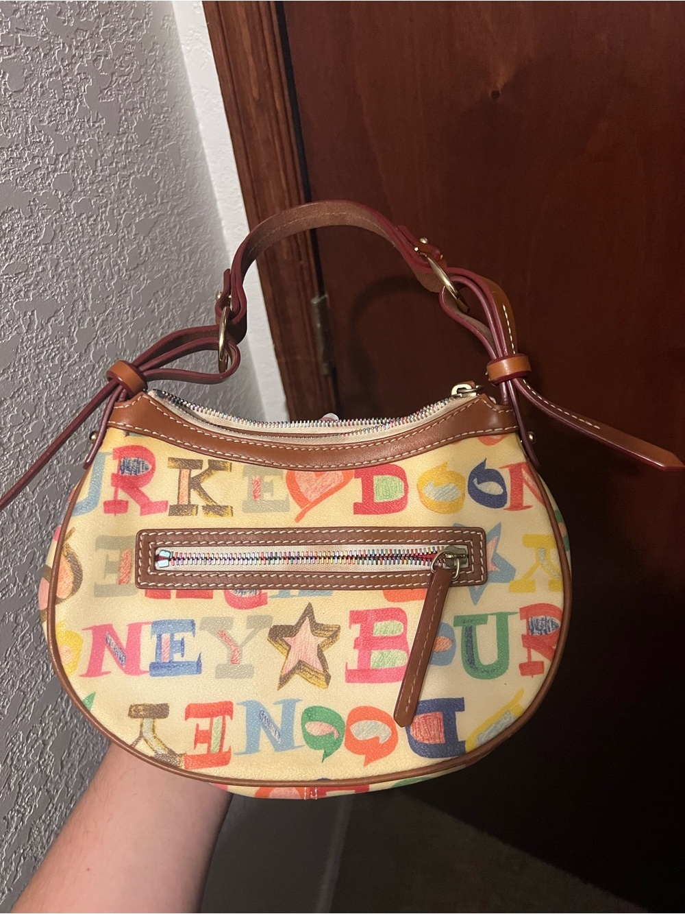 Dooney & Bourke Multicolor Letter Print Crescent Bag with Brown Trim